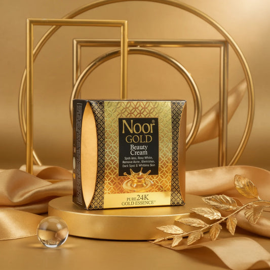 Noor Gold Beauty Cream packaging on a gold background with decorative elements