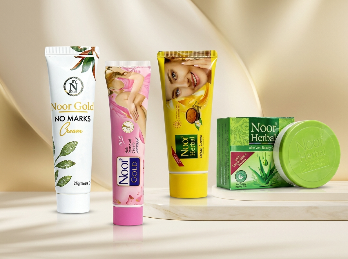 Noor Gold skincare collection featuring No Marks cream, hair removal cream, Noor Herbal cream, and aloe vera beauty cream displayed on a soft neutral background.